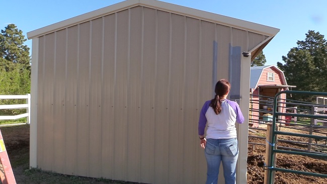 painting a metal barn